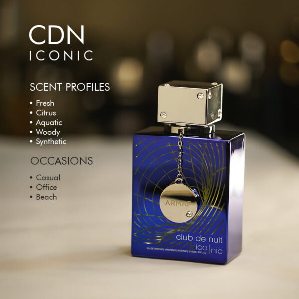 A 105ml bottle of Armaf Club de Nuit Blue Iconic Eau de Parfum with a silver cap and blue liquid on a marble table