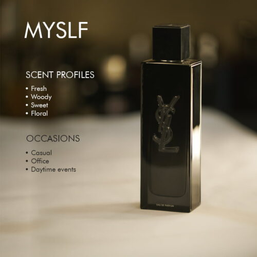 A 100ml bottle of Yves Saint Laurent MYSLF Eau de Parfum with a black cap and clear liquid in a black bottle on a marble table.