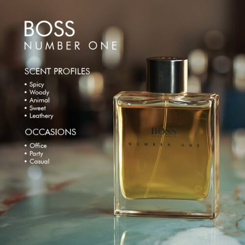 A 100ml bottle of Hugo Boss Boss Number One Eau de Toilette with a golden liquid and black cap on a marble table.