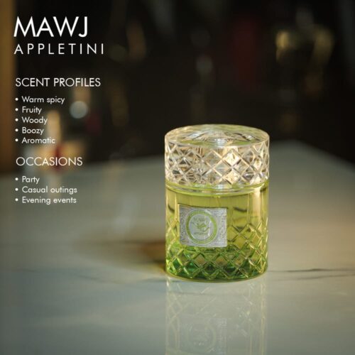 A 100ml bottle of Paris Corner Mawj Appletini Eau de Parfum with a green and clear design on a white table