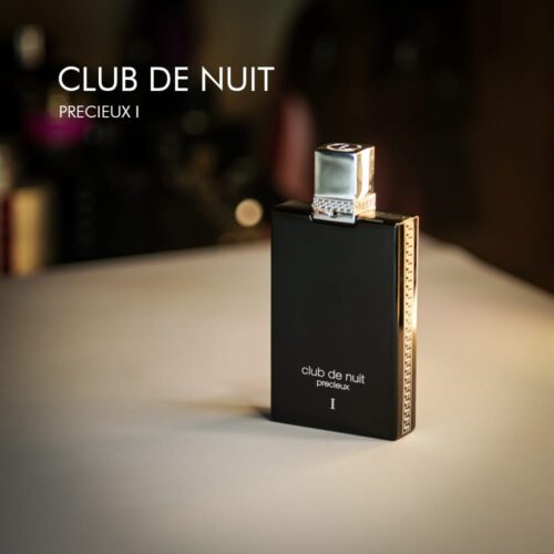 A 100ml bottle of Armaf Club de Nuit Precieux Extrait de Parfum with a black and silver design on a white table