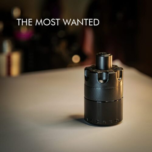 A 100ml bottle of Azzaro The Most Wanted Eau de Parfum Intense with a black barrel-shaped design on a white table