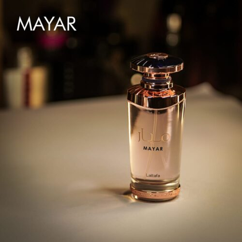 A 100ml bottle of Lattafa Mayar Eau de Parfum with a gold and clear design on a white table