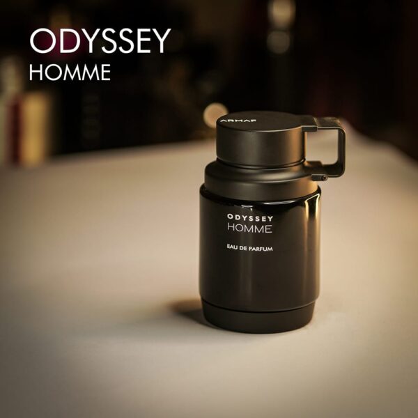 A 100ml bottle of Armaf Odyssey Homme Eau de Parfum with a dark design on a white table