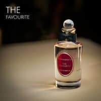 A 100ml bottle of Penhaligon’s The Favourite Eau de Parfum with a clear design on a white table
