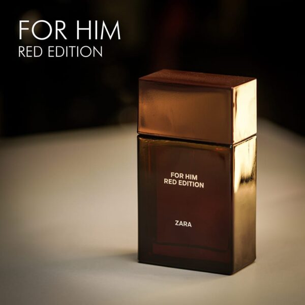 A 100ml bottle of Zara For Him Red Edition Eau de Toilette with a darkish red and golden design on a white table