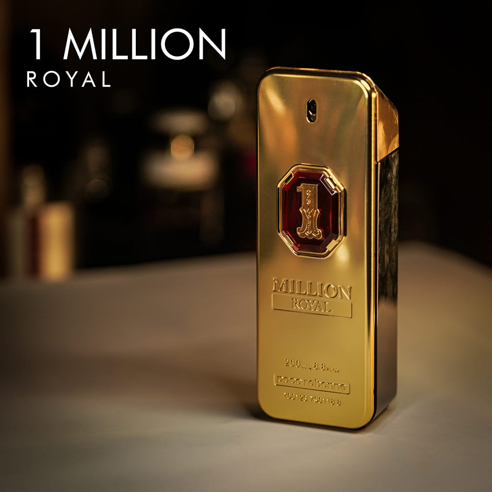 A 100ml bottle of Paco Rabanne 1 Million Royal Eau de Parfum with a gold and red design and a rectangular shape on a brown table