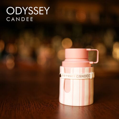 A 100ml bottle of Armaf Odyssey Candee Eau de Parfum with a pink and white design on a white table