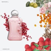 A 75ml bottle of Parfums de Marly Delina Exclusif Eau de Parfum with a pink glass body, gold detailing, and a chrome cap