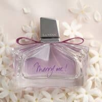 6 Luxurious Lanvin Marry Me perfume bottle with white flowers background, floral fragrance, romantic gift.