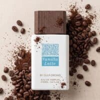 15 Rich vanilla latte perfume with coffee bean scent, presented in elegant bottle with coffee grounds.