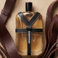 Luxurious men's perfume with leather straps and warm amber fragrance | Aromatica.one.